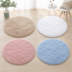 Pink, white, khaki, and blue round plush area rug color options.