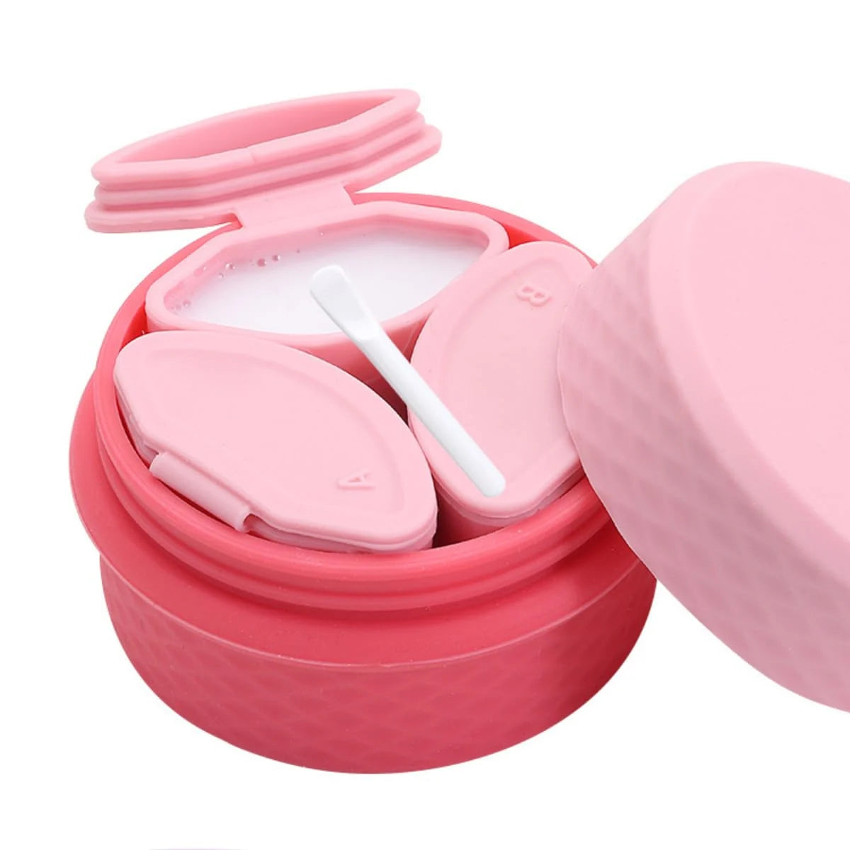Open pink cosmetic storage organizer with three dispensers and spoon