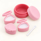 Pink cosmetic storage organizer with three removable dispensers and spoon