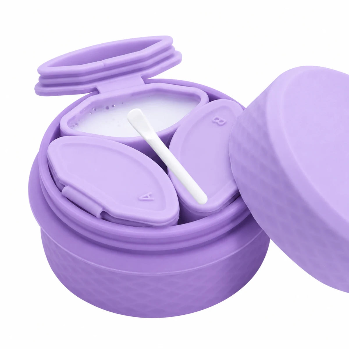 Open purple cosmetic storage organizer with three dispensers and spoon