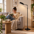 Black adjustable E26 floor lamp in an affordable apartment reading corner