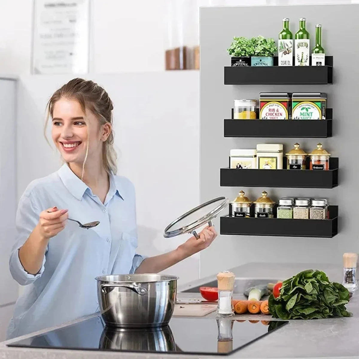 Black ABS magnetic spice rack used beside a home cooking area