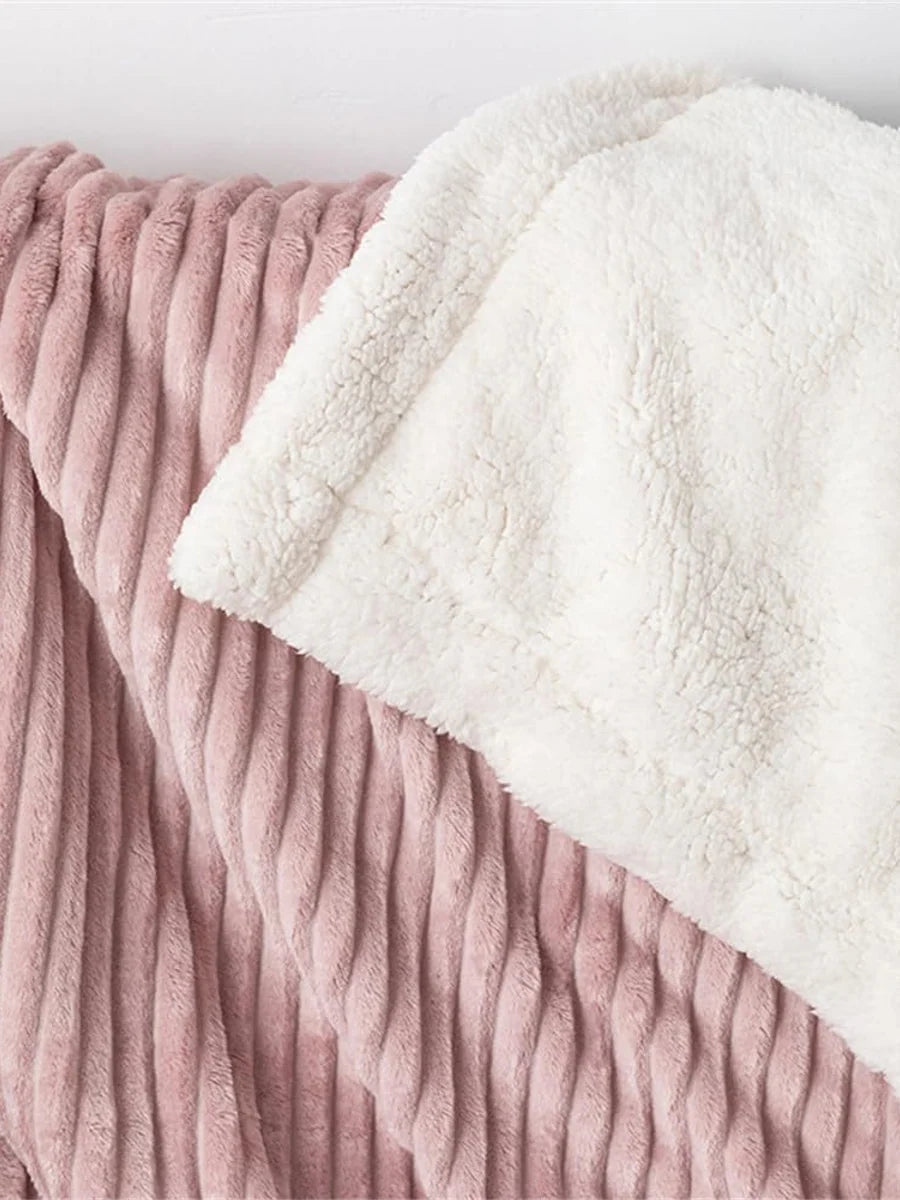 Close view of pink ribbed fabric and white sherpa lining