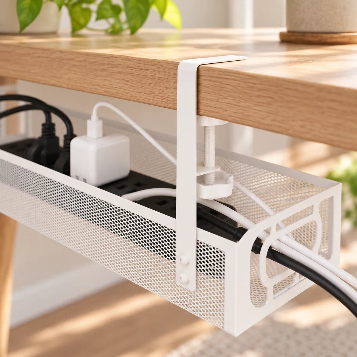 Close view of the white cable tray clamp, mesh basket and cable-pass opening