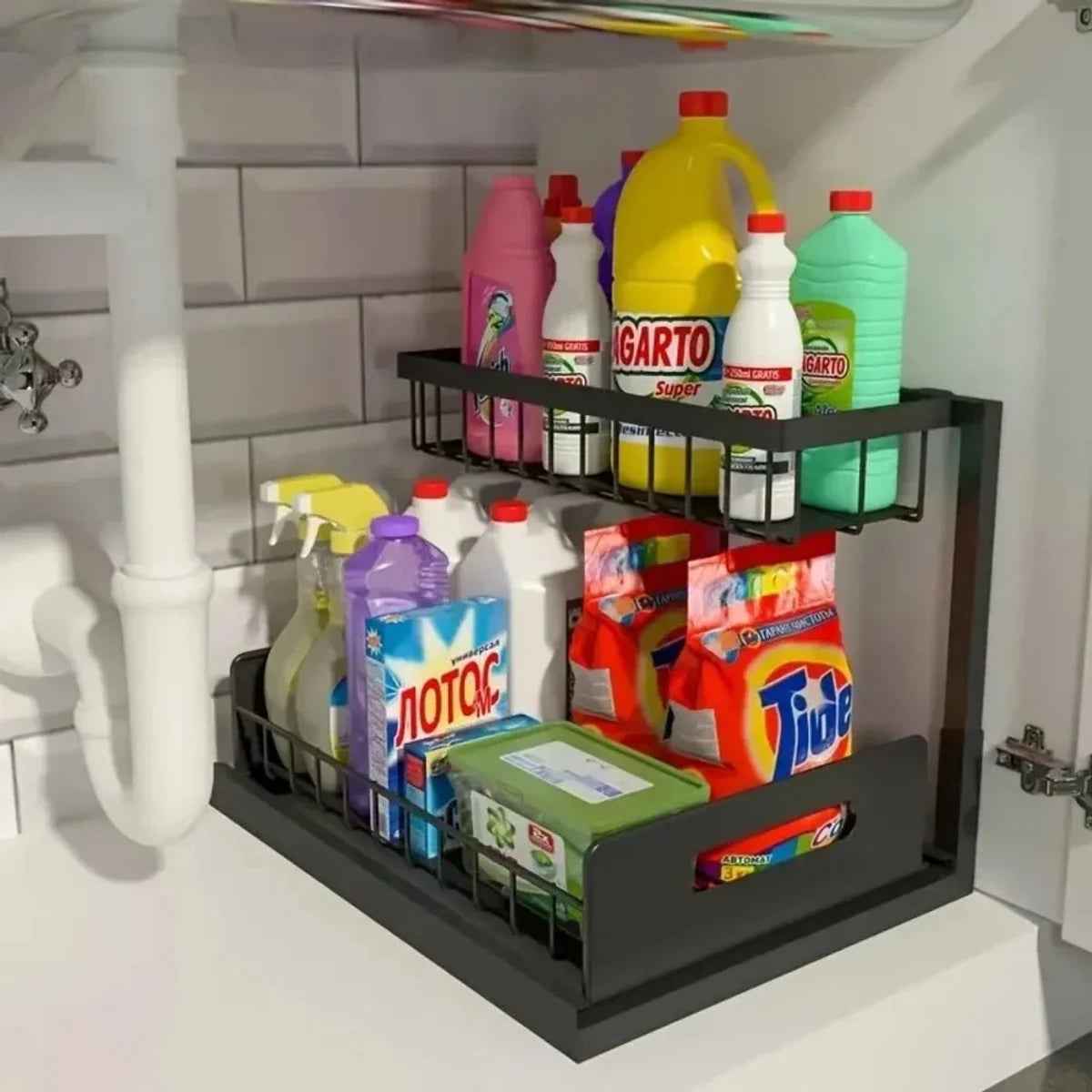 Black two-tier under-sink organizer holding cleaning supplies