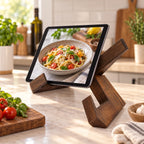 Wooden cookbook stand holding a tablet in a refined kitchen setting