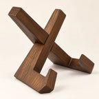 Dark wooden cookbook stand shown from an alternate angle with its interlocking construction