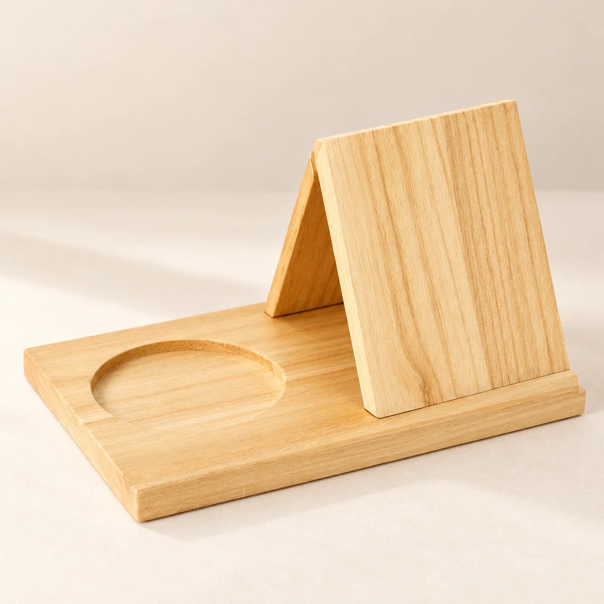 Natural wood reading stand shown empty from an alternate angle