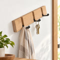 Wall-Mounted Coat Rack with Flip Hooks in a styled lifestyle setting