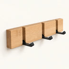 Wall-Mounted Coat Rack with Flip Hooks clean product view on a warm neutral background